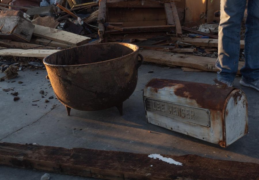 A “tea kettle” and a mailbox, belonging to Marvalyn Tolbert, stand as a few of the important heirlooms found among the debris of a storage unit that was hit by the Dec. 10 tornado Dec. 19, 2021 in Dawson Springs, Ky.
