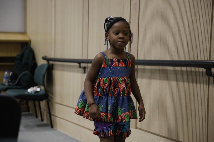 London Wilder shows off her African American inspired outfit during the Afro-Centric Fashion Show on Feb. 27, 2022 at the Guyon Auditorium in Morris Library in Carbondale, Ill. 