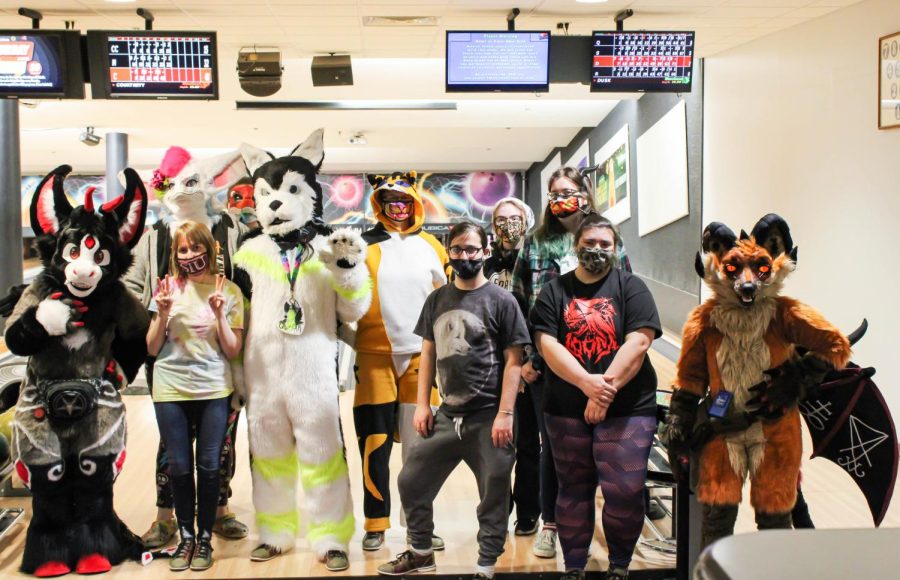 The members at the Furbowl event gather in front of the lanes to pose for a photo in the Student Center bowling alley Feb. 27, 2022 at SIU in Carbondale, Ill. “All of the costumes that I have I made myself mainly for cost reasons. If you commission one from a professional maker youre at least spending upwards of $3,000,” said Tyler Knupp, founder of the Saluki Furry Society.