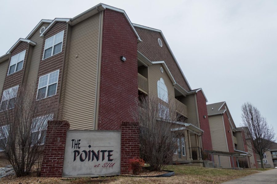 The Pointe at SIU sign stands outside of an apartment building Feb. 12, 2022 at the Pointe in Carbondale, Ill. 

