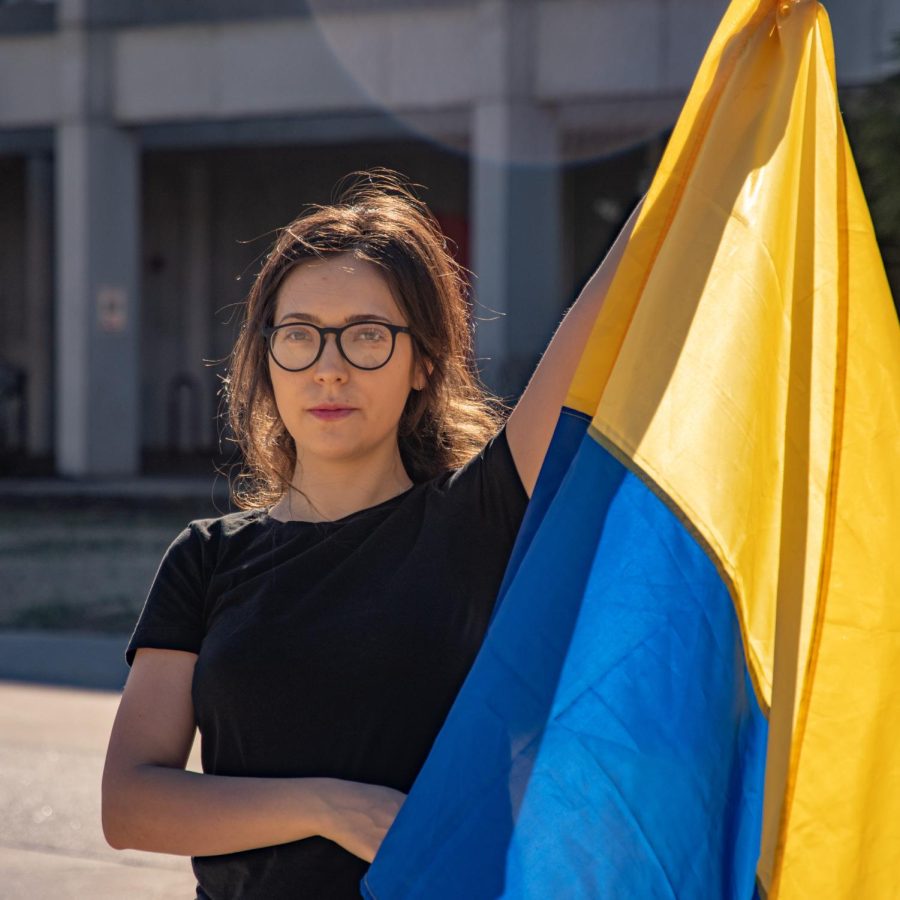 Diana Butsko, a Ukrainian masters student at SIU, holds a Ukrainian flag March 2, 2022 in Carbondale, Ill. 