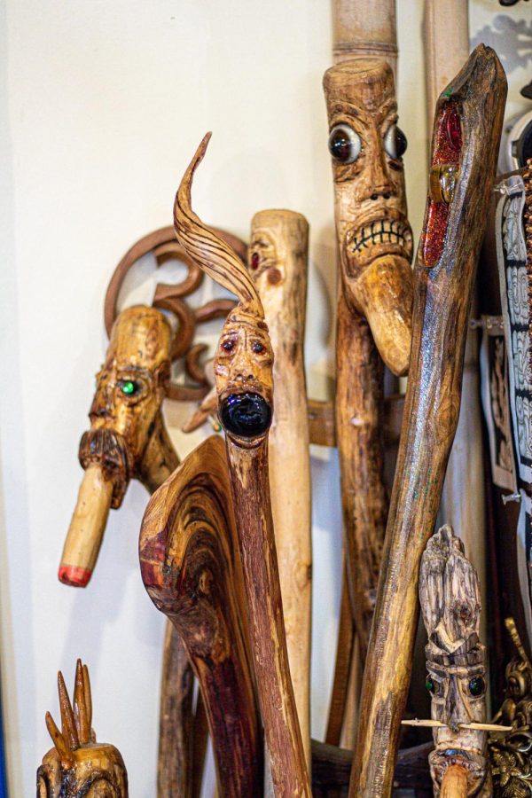 Walking sticks carve with strange faces at the Makanda Trading Company March 21, 2022 in Makanda, Ill.
