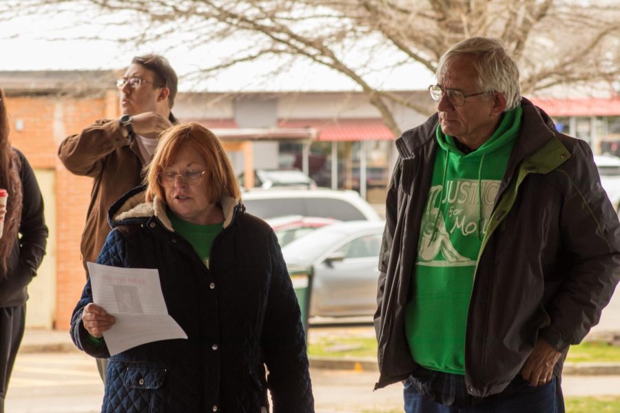 Larry Young (right) and Linda Lamont-Young, father and stepmother of Molly Young, speak to the community on the case of their late daughter at Turley Park March 27, 2022 in Carbondale, Ill.
