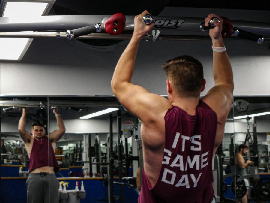 A student works out at the SIU Student Recreation Center March 28, 2022 in Carbondale, Ill. 