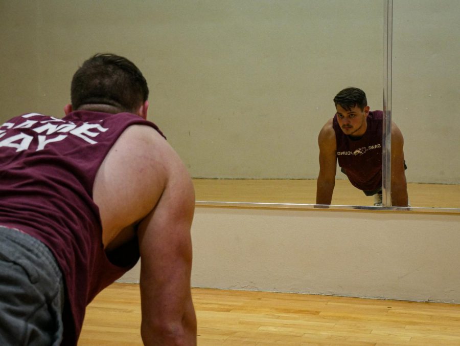 A student works out at the SIU Student Recreation Center March 28, 2022 in Carbondale, Ill. 