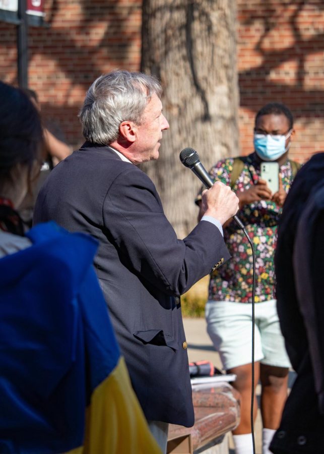 Father Dale Coleman shares his thoughts on the conflict in Ukraine during the Support Ukraine Rally on March 3, 2022 at Faner Plaza in Carbondale, Ill.  