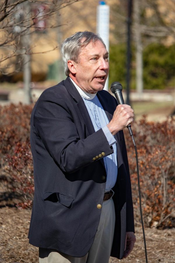 Father Dale Coleman speaks during the Support Ukraine Rally on March 3, 2022 at Faner Plaza in Carbondale, Ill. 
