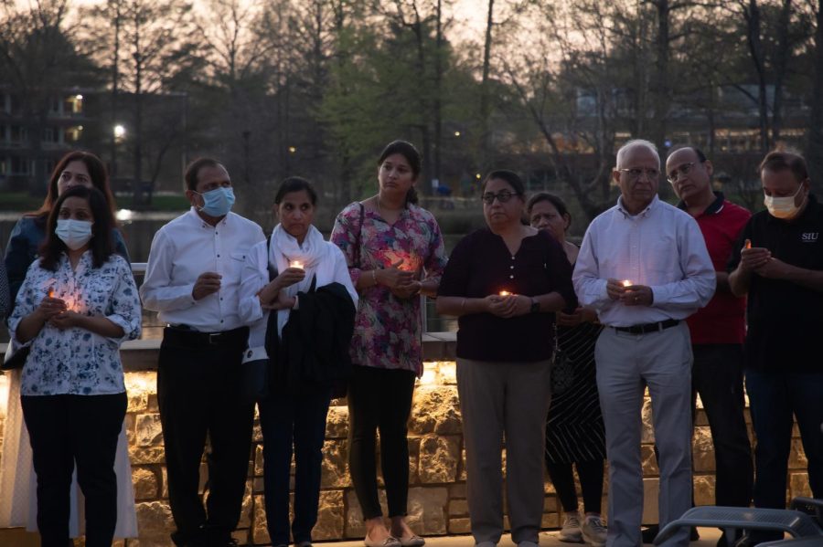 Community members gather to mourn the loss of SIU graduate students Vamshi Krishna Pechetty and Pavan Swarna April 22, 2022 at Becker Pavilion in Carbondale, Ill. 