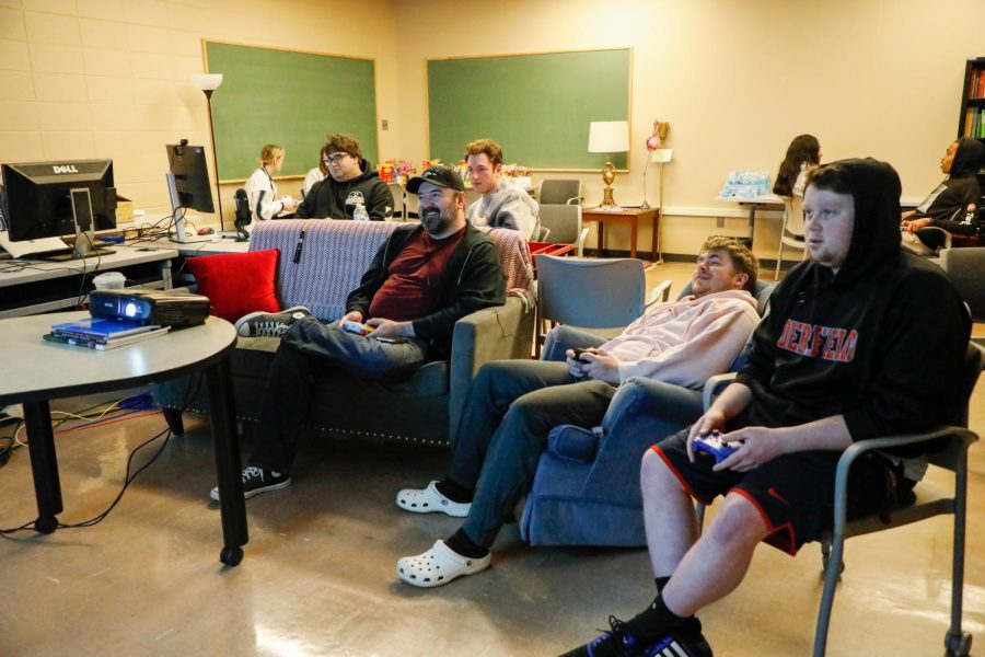 Visitors gather in the SIU Communications Building to play videogames on Thursday, April 7, 2022 in Carbondale, Ill. This event was held by SalukiGames and live streamed on playingforpets.com, Twitch, Facebook, and YouTube.