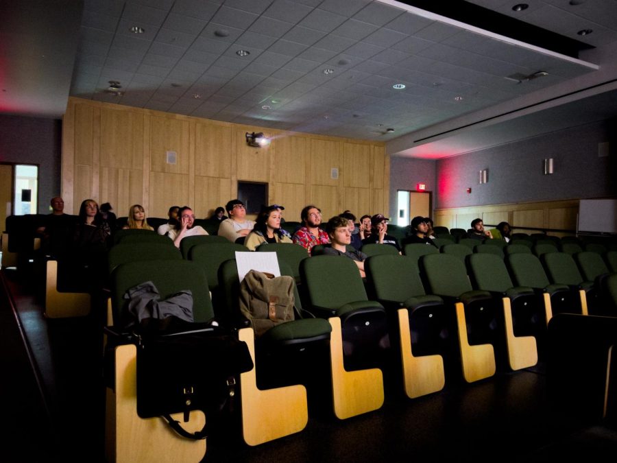 Students watch their fellow classmates films at Morris Library April 12, 2022 in Carbondale Ill.
