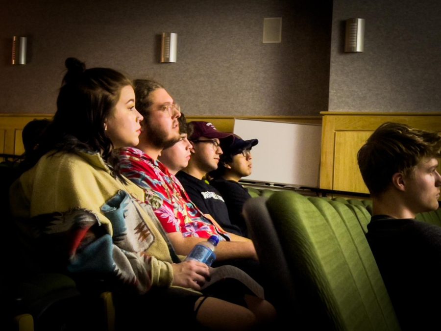 Students watch an experimental film created by one of their classmates at Morris Library April 12, 2022 in Carbondale Ill.
