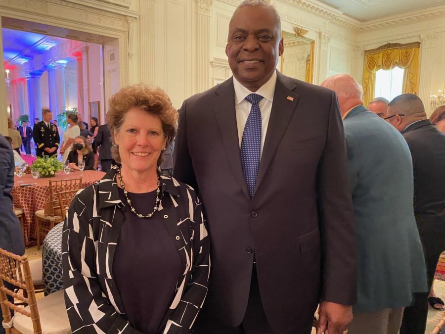 SIU School of Journalism and Advertising Director Jan Thompson poses with Secretary of Defense Lloyd Austin at the White House Memorial Day Breakfast May 30, 2022 in Washington, D.C.