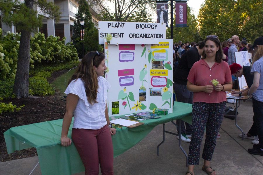 Plant Biology RSO members observed the fair whilst they waited for more students to stop by  Aug. 25, 2022 at Faner Plaza Involvement Fair in Carbondale, Ill. 
