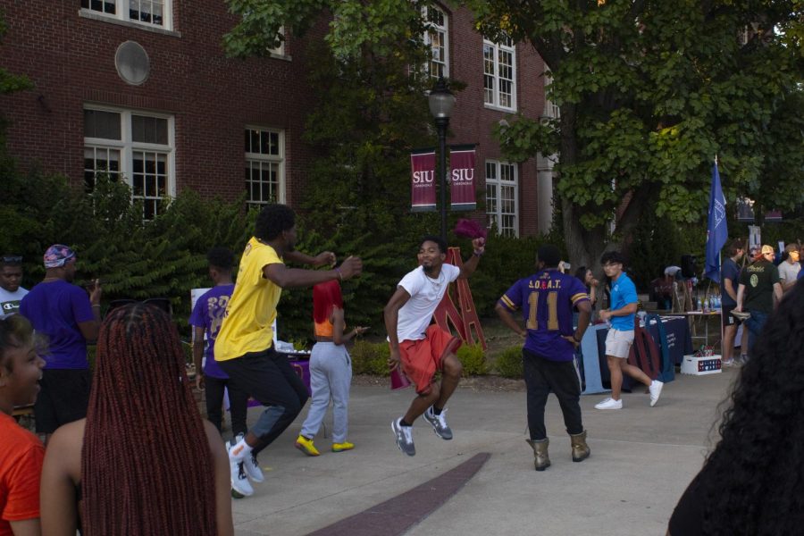 Members of Omega Psi Phi danced to music to show students what one of the very many things their fraternity does here at SIU Aug. 25, 2022 at Faner Plaza Involvement Fair in Carbondale, Ill. 
