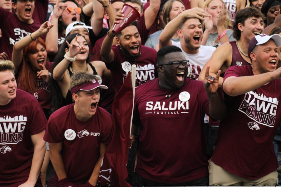 Students cheer on the Salukis from the Dawg Pound celebrating the return of home football games with the War Of The Wheel game against Southeast Missouri State University (SEMO) Sept. 10, 2022 at Saluki Stadium in Carbondale, Ill.