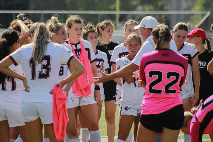 The Saluki Soccer team gathers together to talk with Head Coach Craig Roberts after the first conference play against Drake University Bulldogs on Sept. 18, 2022 at the Lew Hartzog Track & Field Complex in Carbondale, Ill.