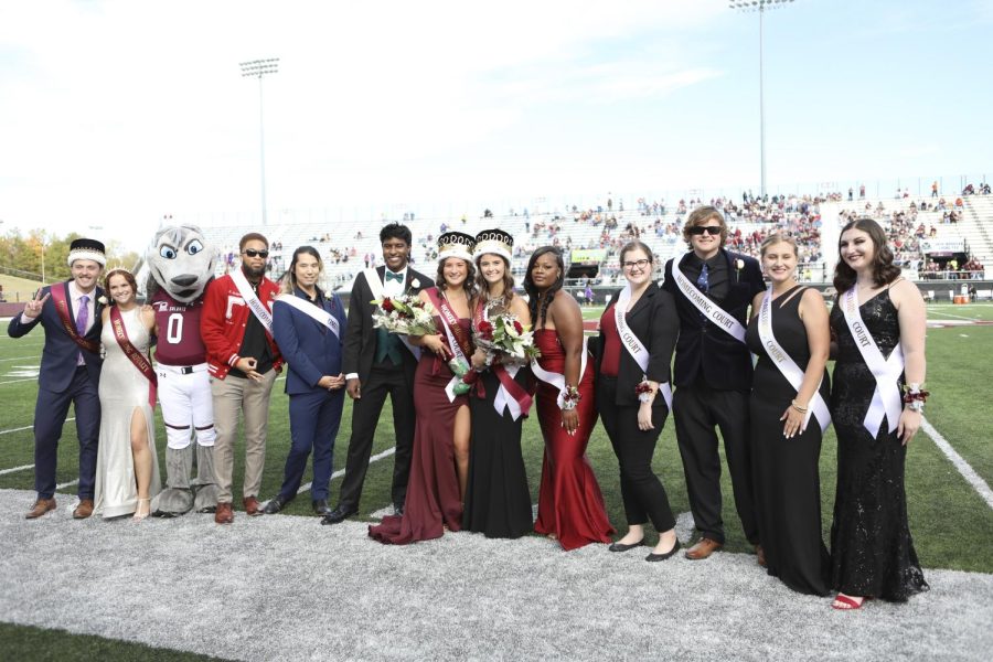 The Saluki 2022 Homecoming Court: Brandon Goede, Claire Waldon, Grey Dawg, Rob Hodges, Julian Acevedo, Kylen Lunn, Grace Gonzalez, Brittany Wendel, Rose South, Jacob Vezensky, Arianna Goss and Alaina Herman pose for a photo Oct, 15, 2022 at Saluki Stadium in Carbondale, Ill. 