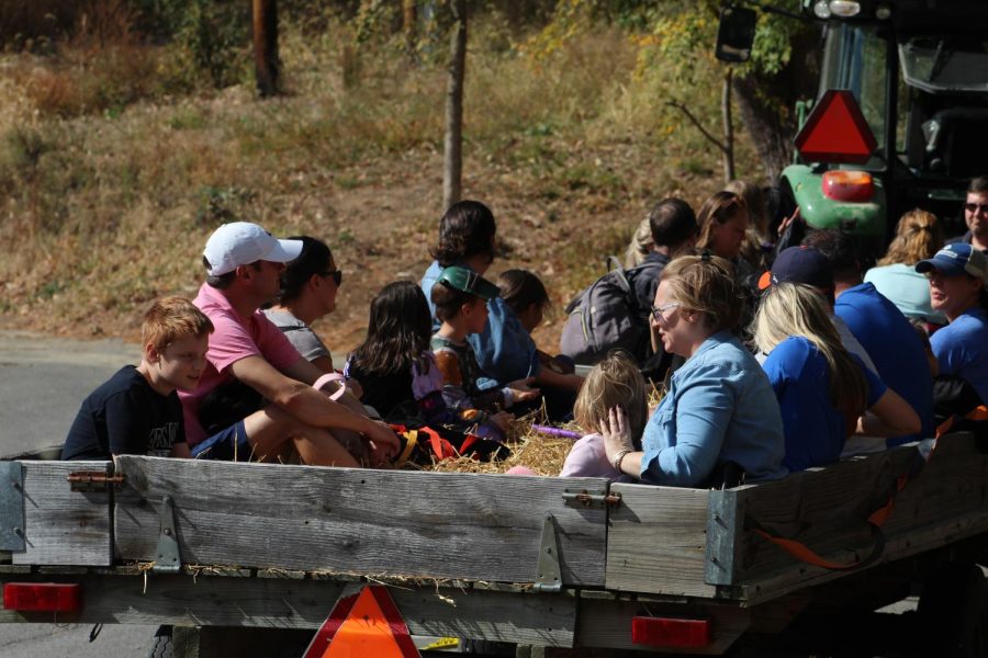 Families ride the hayride at The Haunted Hollow event Oct. 23, 2022 at Touch of Nature in Makanda, Ill. 