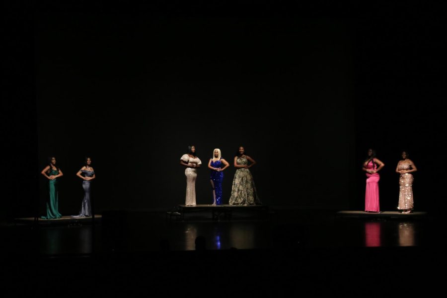 The seven contestants of the 49th annual Miss Eboness pageant stand on stage after the introduction portion Oct. 15, 2022 at Shyrock Auditorium in Carbondale, Ill.