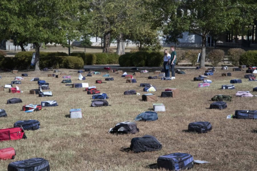 Backpacks lay out across Morris Library Lawn Oct. 10, 2022 at Morris Library in Carbondale, Ill. 
