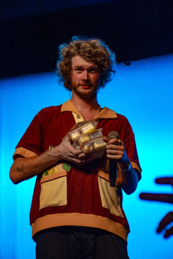 Yung Gravy tosses Lunchables into the crowd at Shryock Auditorium Oct. 12, 2022 in Carbondale, Ill. 