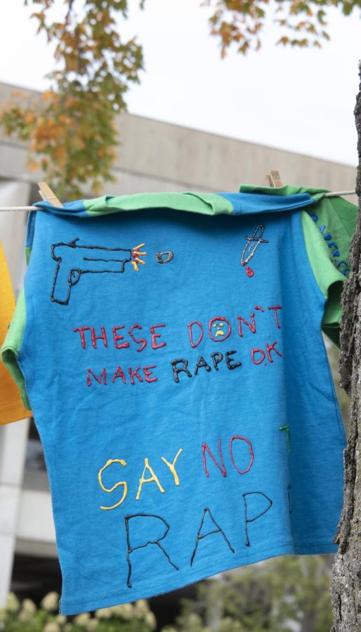 A shirt that says “These don’t make rape ok. Say no to rape” hangs in front of Faner Plaza Oct. 11, 2022 at SIU in Carbondale, Ill. “We provide services and assistance to all survivors of violence, and so the purpose of the center is just to assist survivors that are dealing with domestic violence and or survivors of sexual assault,” Anna Margum the domestic violence program coordinator said.