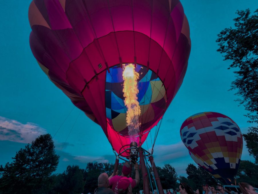 Hot air balloon operators prepare for the Balloon Glow Aug. 20, 2022 at the Centralia Balloon Festival in Centralia, Ill.

