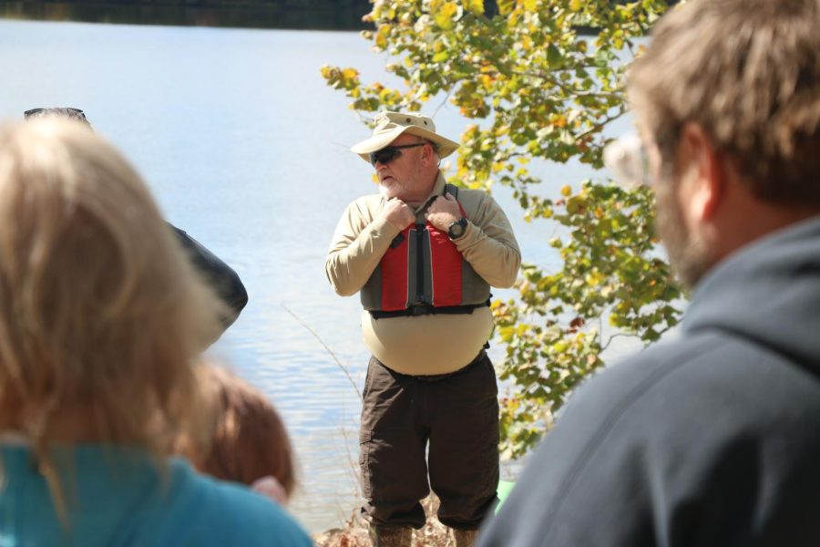 Ranger Bob Dietrich talks to visitors before taking them out on the lake during the celebration of the 75th anniversary of Crab Orchard Oct. 8, 2022 at Crab Orchard National Wildlife Refuge in Marion, Ill.