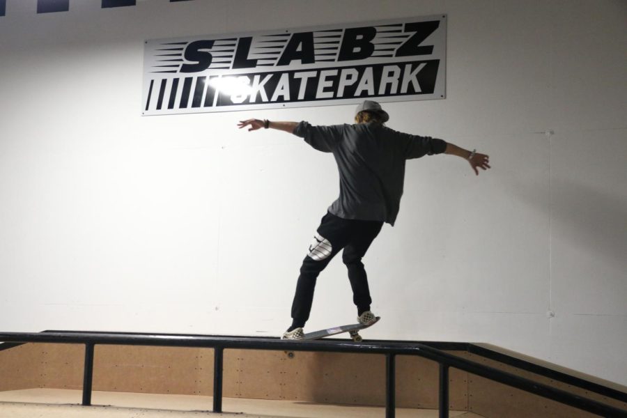 Nathaniel Fisher rides a ledge Dec. 2, 2022 at the new Slabz indoor skate park in Carbondale, Ill. 