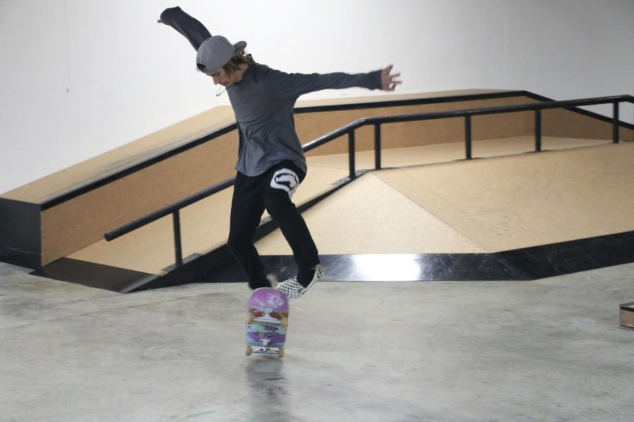 Nathaniel Fisher rides his skateboard at the newly opened indoor skate park Dec. 2, 2022 at Slabz indoor skate park in Carbondale, Ill.