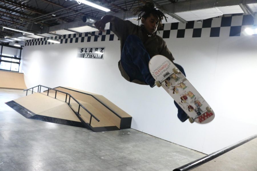 A skater attempts a trick on a ramp Dec. 2, 2022 at the new indoor skate park in Carbondale, Ill. 