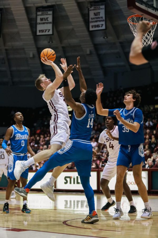 Marcus+Domask+%281%29+leaps+to+approach+the+basket+against+the+defending+Bulldogs+of+Drake+University+Jan.+4%2C+2023+at+the+Banterra+Center+in+Carbondale%2C+Ill.+