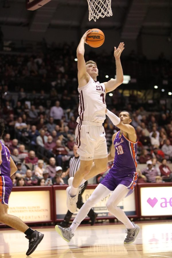 Marcus Domask (1) goes up for the basket against the University of Evansville Purple Aces Jan. 17, 2023 at Banterra Center in Carbondale, Ill. Domask led the game with 31 points for the Salukis moving them to a 9-1 record in Banterra