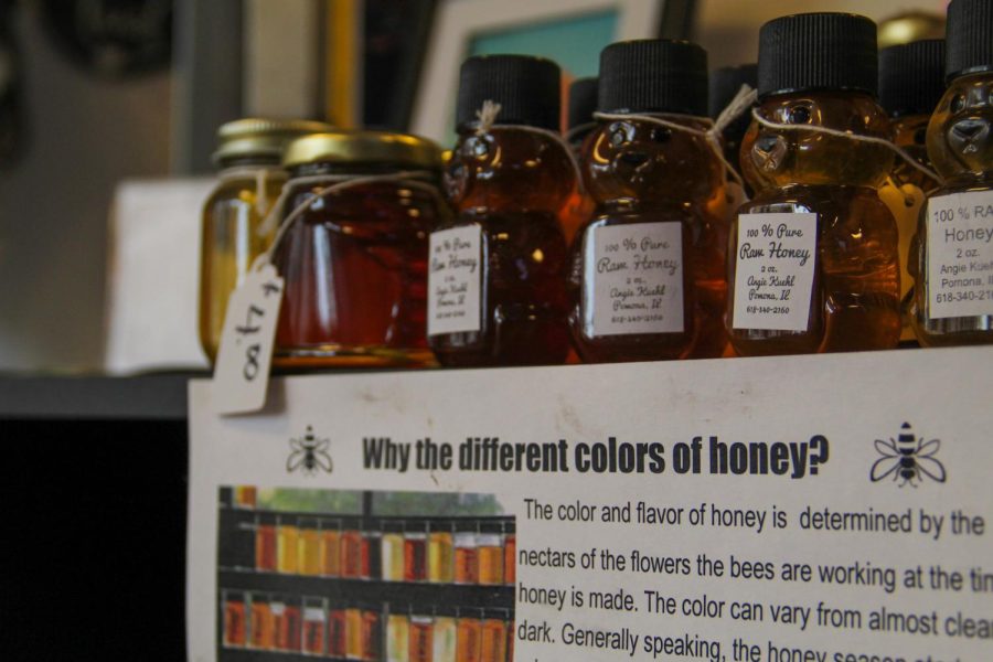 Different flavors of honey are advertised at Electric Larry’s vintage thrift store Jan. 28, 2023 in Carbondale, Ill. 