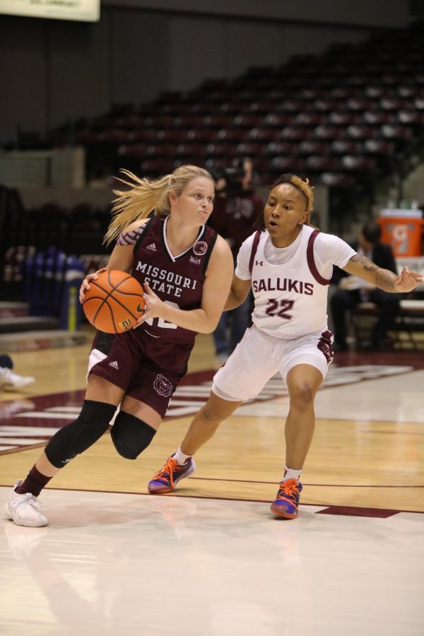 Jaidynn Mason (22) guards Paige Rocca (22) of Missouri State as she follows her down the court Feb. 01, 2022 at Banterra Center in Carbondale Ill.