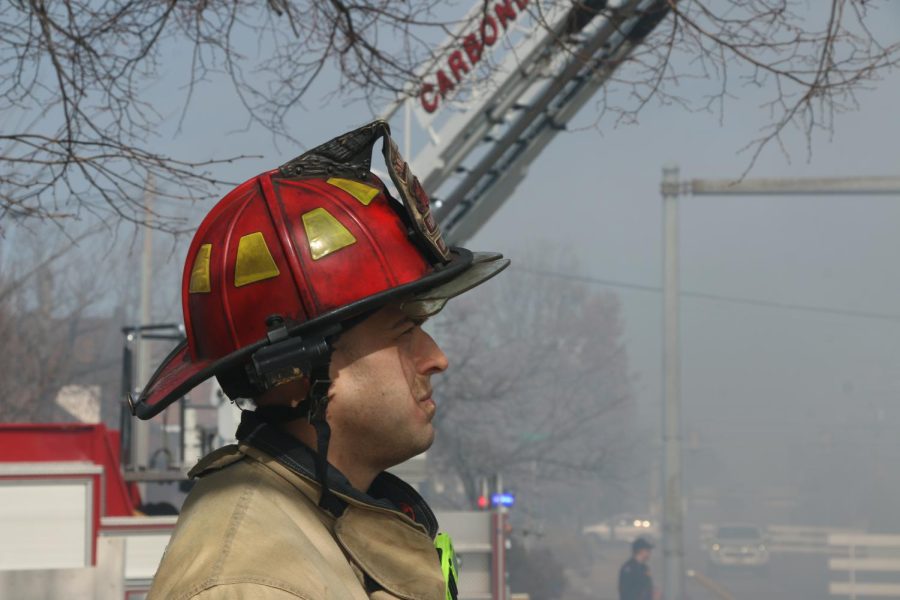 Captain Fairfield, of the Carbondale Fire Department, watches as firefighters contain the fire at the Missionary Baptist Church Monday Feb. 6, 2023.