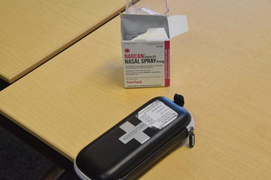 Brent Van Ham of SIU School of Medicine [Center] provided free Narcan to the audience in case they should ever witness an overdose Feb. 5, 2022 at the Public Library in Carbondale, Ill.