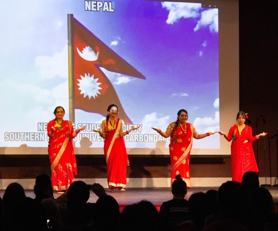SIU students from Nepal perform a cultural dance for the audience at the Student Center Ballroom Feb. 10, 2023 at SIU in Carbondale, Ill.