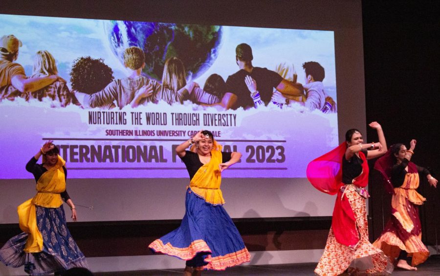 SIU students from India perform a cultural dance in their traditional clothes for the audience at the Student Center Ballroom Feb. 10, 2023 at SIU in Carbondale, Ill