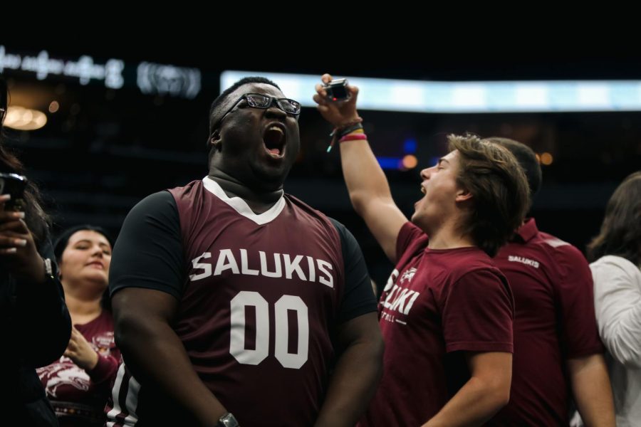 Tyler Lawrence celebrates alongside the Dawg Pound when the Salukis take on the Bears of Missouri State in The Missouri Valley tournament Mar. 3, 2023 at the Enterprise Center in St. Louis, Missouri. 