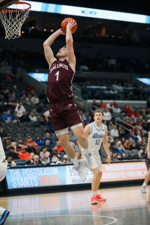 Marcus Domask (1) gets up to dunk the ball against the opposing Drake Bulldogs at the Arch Madness Semifinal Mar. 4, 2023 at the Enterprise Center in Saint Louis, MO.