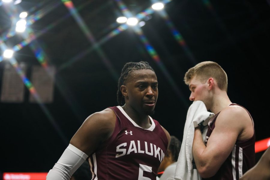 Emotions run high as seniors Lance Jones (5) and Marcus Domask (1) exit the court for their last appearance in the Arch Madness tournament as the Salukis fall to the Bulldogs of Drake Mar. 4, 2023 at the Enterprise Center in Saint Louis, MO.