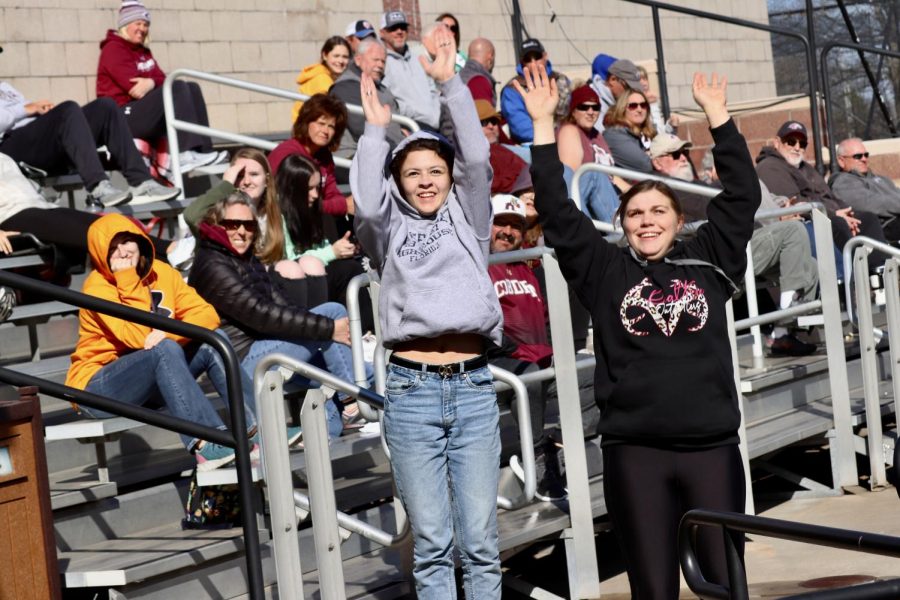 Crowd dance to the music played in the second game of the conference play against the Beacons of Valpo March 17, 2023 at the Charlotte West Stadium in Carbondale, Ill.