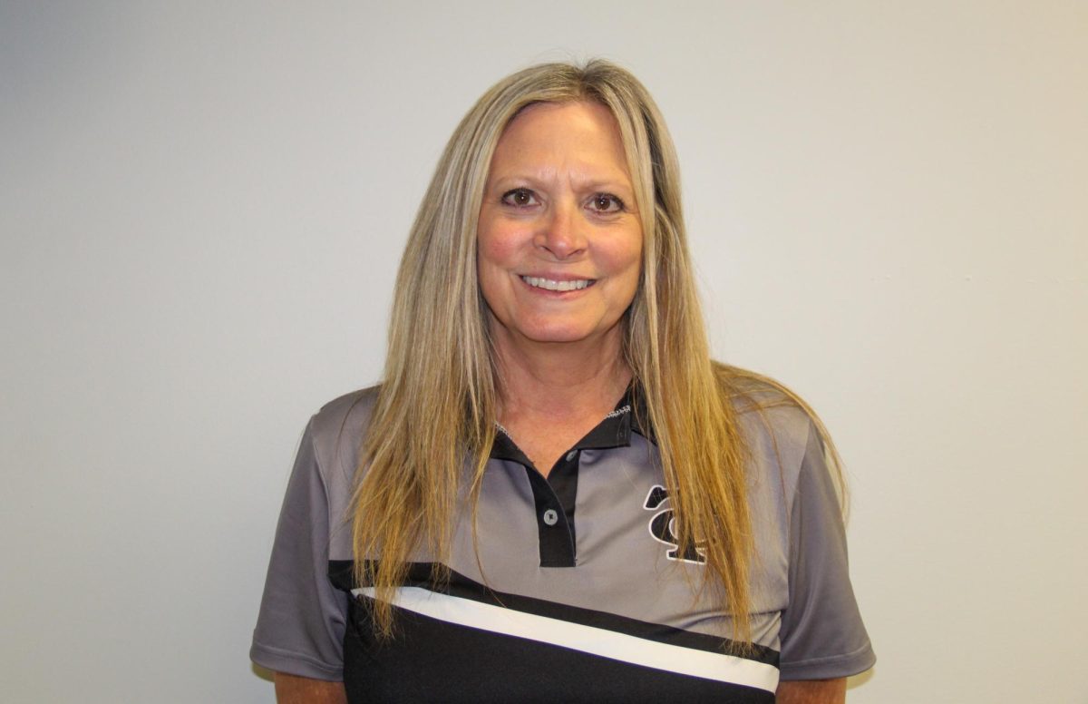 Gwen Poore is a multisport athlete who runs the sports department for Carbondale Community High School.