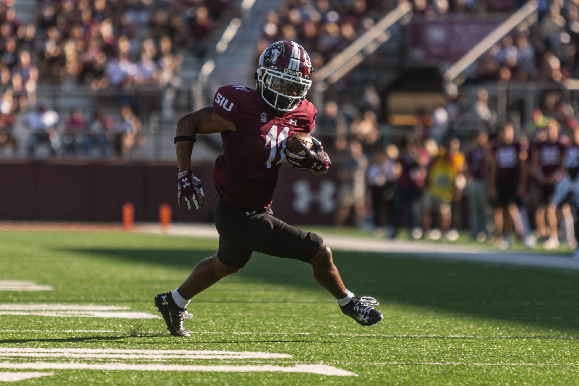 Vinson Davis III (11) runs the ball down the field towards the end zone which resulted in the second touchdown for SIU against the Bears of Missouri State Sept. 30, 2023 at Saluki Stadium in Carbondale, Illinois. 