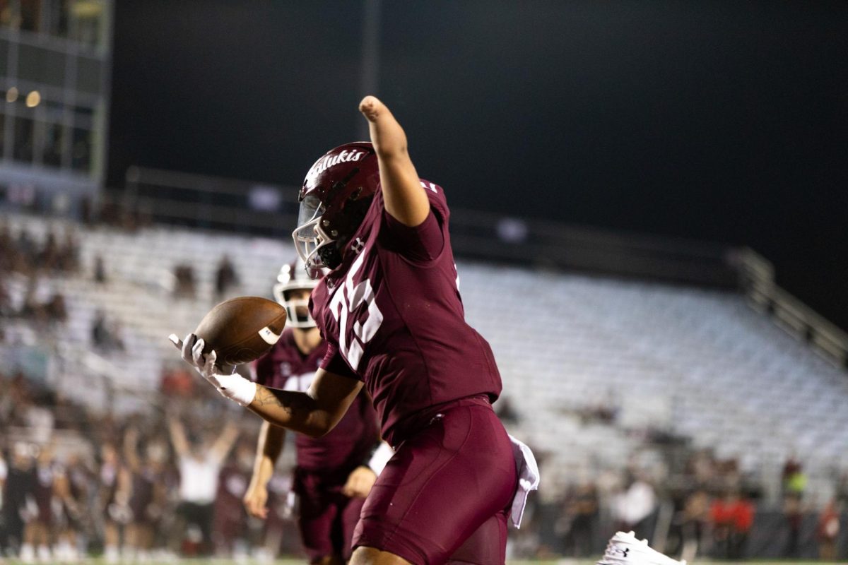 Freshman Kayleb Wagner (25) celebrates his first ever collegiate touchdown with Southern Illinois at the end of the game in the fourth quarter Sept. 2, 2023 at Saluki Stadium in Carbondale, Ill. 