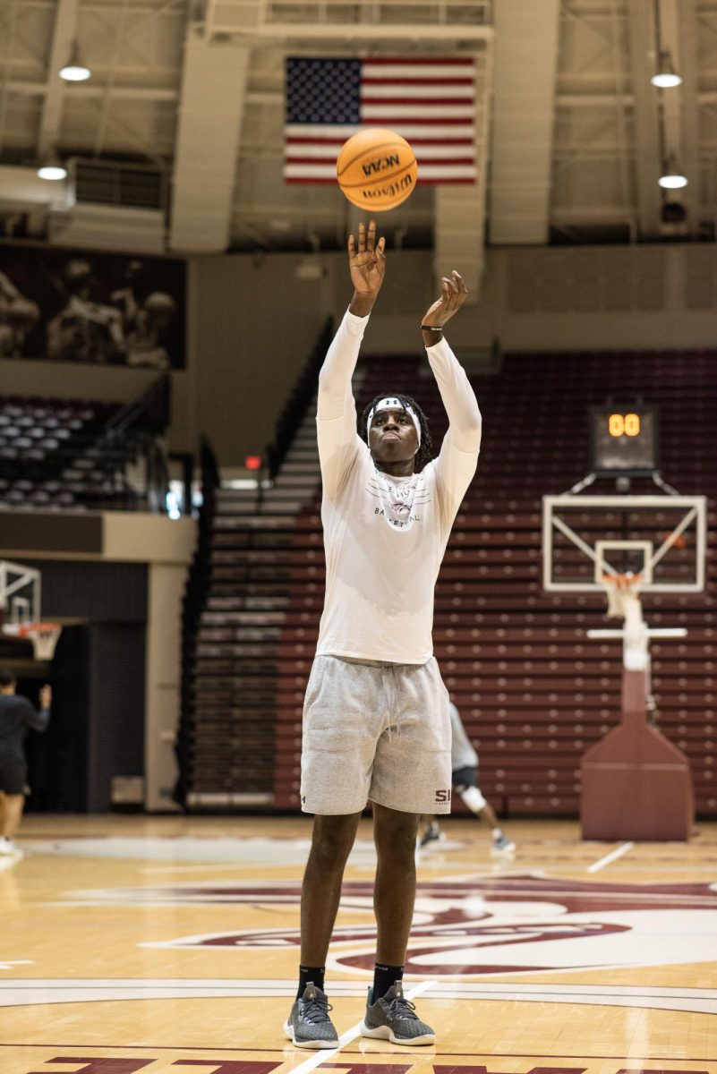 Clarence Rupert shoots the ball in an afternoon practice Oct. 17, 2023 at Banterra Center in Carbondale, Illinois.