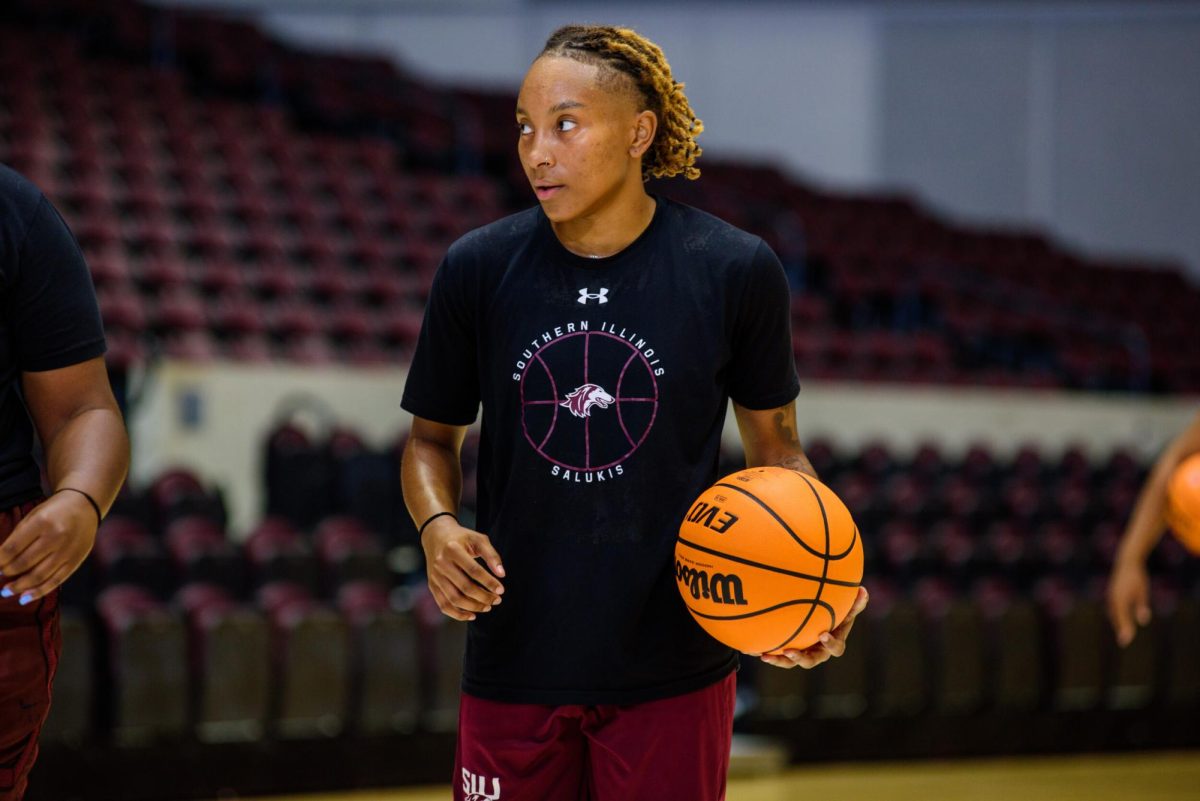 Jaidynn Mason (22) carries the ball as the Salukis prepare for the upcoming season Oct. 2023 at Banterra Center in Carbondale, Illinois. 