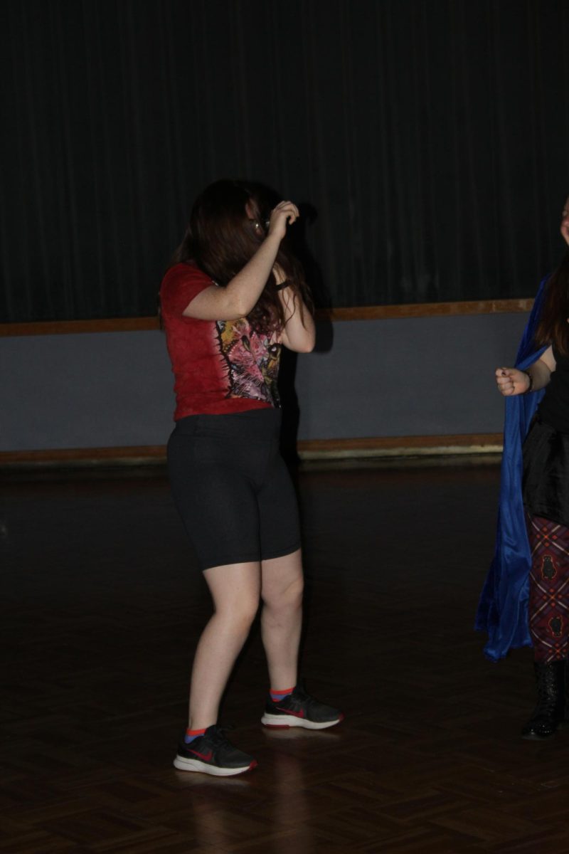 During the Spooky Saluki Costume Party, Pam T., dances to EDM music in the student center ballroom on October 21, 2023 in Carbondale, Illinois.