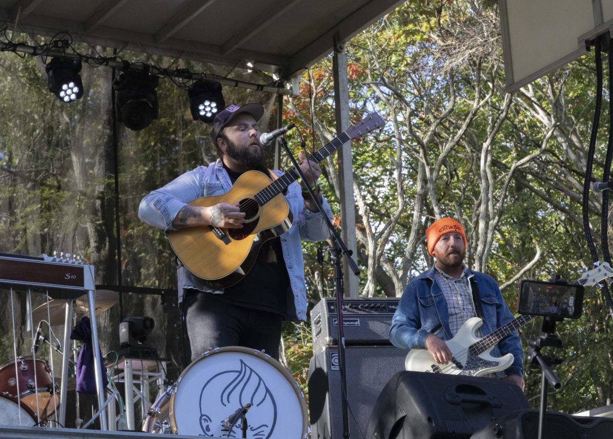 Jeremy Todd (left) sings and plays guitar on the Main Stage while being backed up by his bass player Oct. 7, 2023 at the Little Grassy Get Down in Makanda, Illinois.